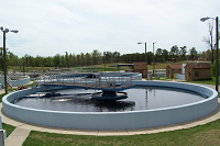 Circular containers of water with clarifying equipment